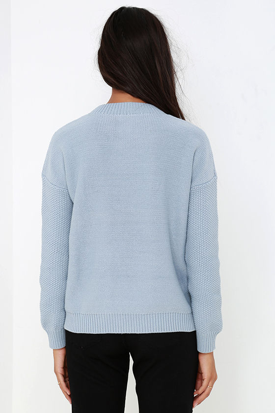 light blue sweater