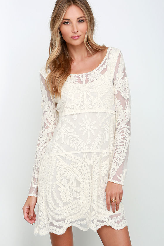 cream dress with black lace overlay