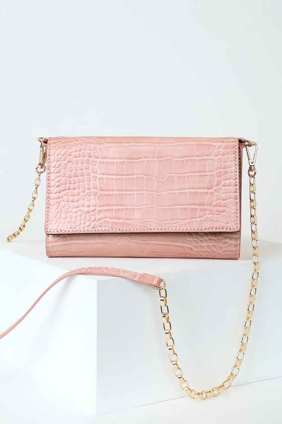 blush coloured clutch bag