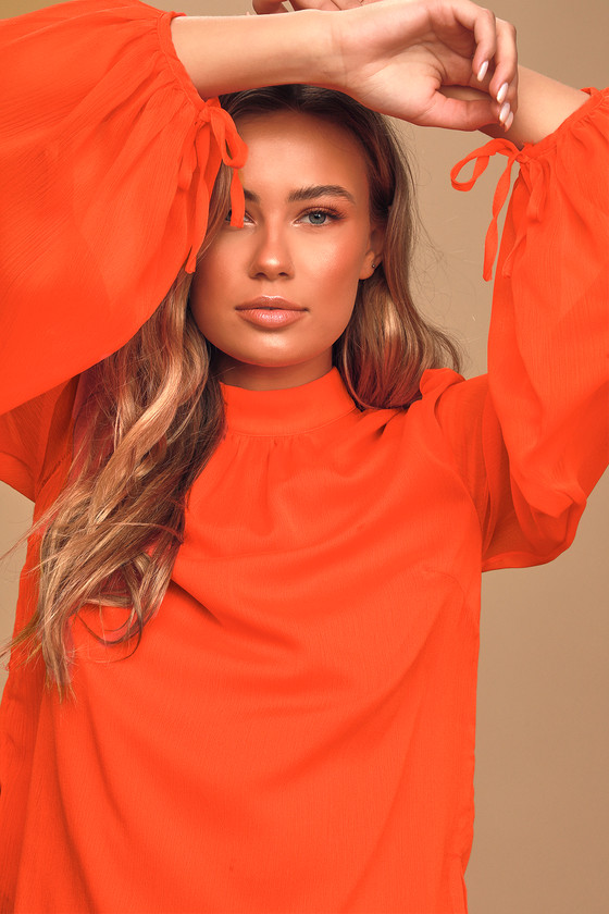 Orange mock neck top best sale