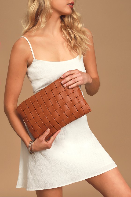 tan woven clutch