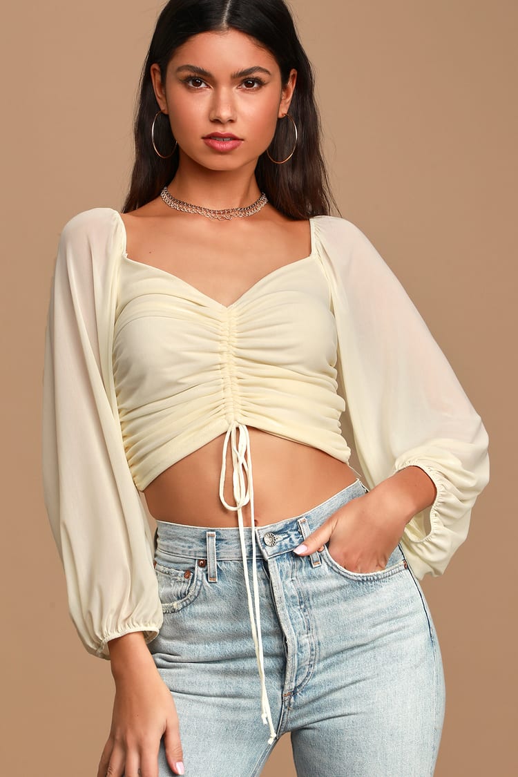 Completely Charmed Cream Ruched Long Sleeve Crop Top