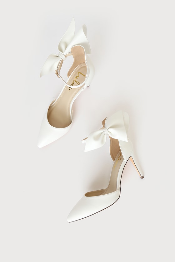 White heels with bow on outlet back